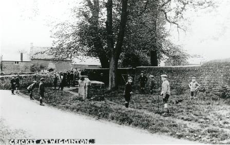 Boys playing cricket